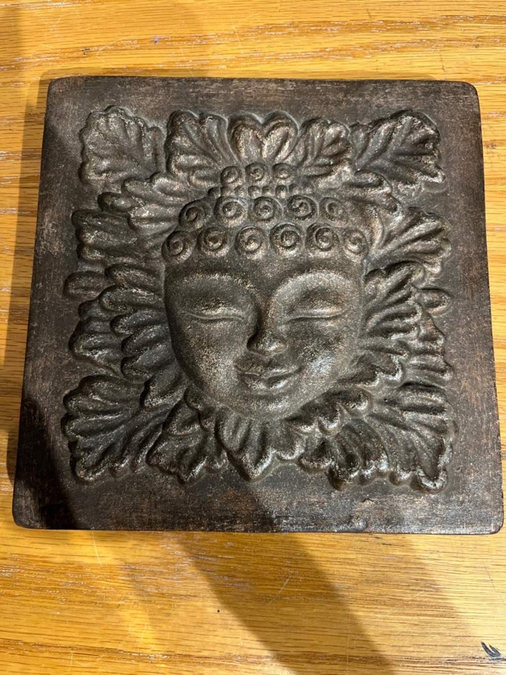 ceramic Buddha wall hanging